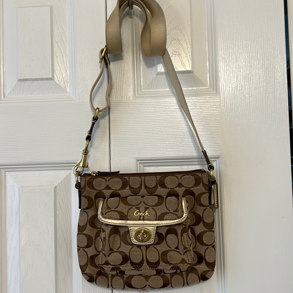 Coach small crossbody bag. Gold hardware with adjustable strap.